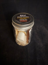Load image into Gallery viewer, S'more Season Booze Infusion with s'more ingredients inside a 16 ounce glass jar.