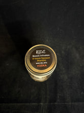 Load image into Gallery viewer, "S'more Season Booze Infusion, works well with Vodka" top label on silver lid.