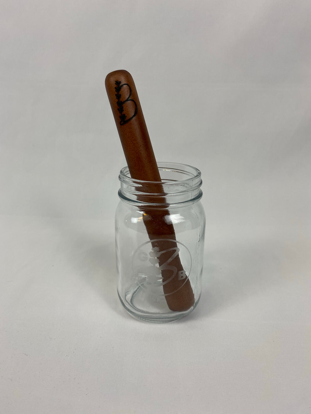 Muddler featuring logo wood burned by hand